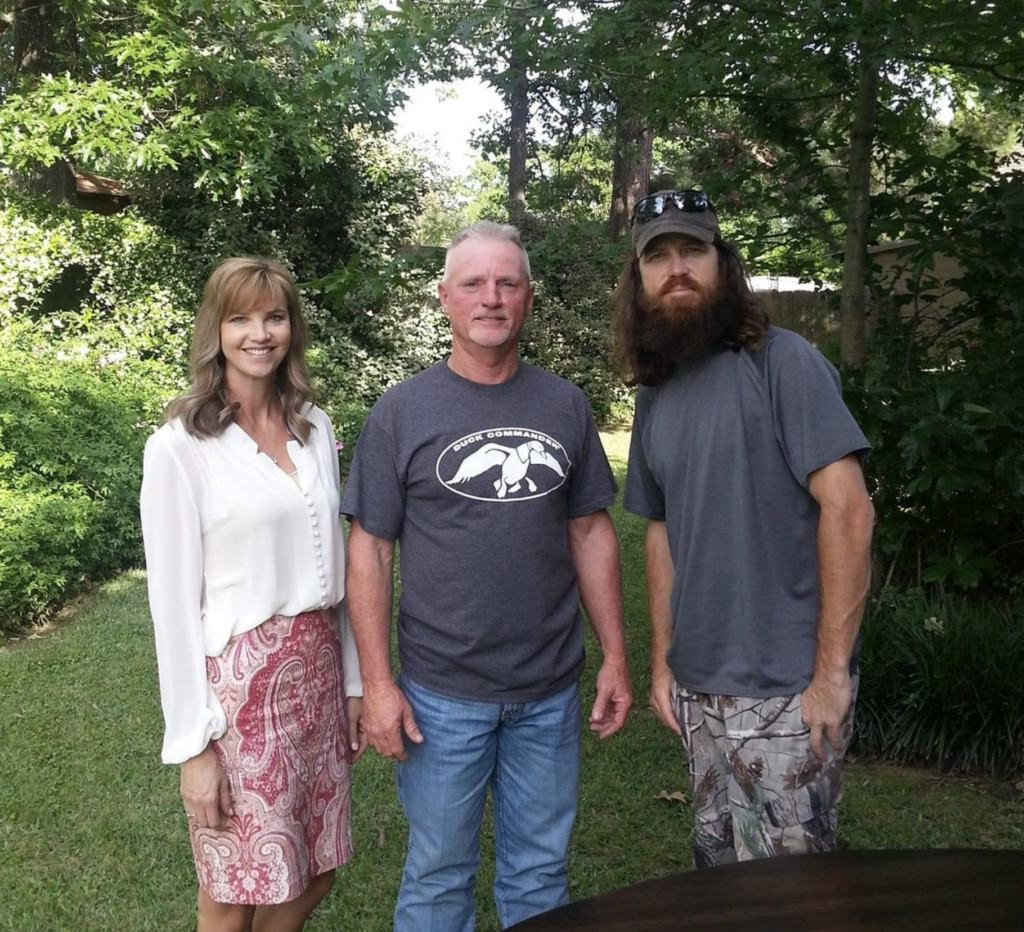 Jase Robinson with Jimmie Hatfield after building a custom table